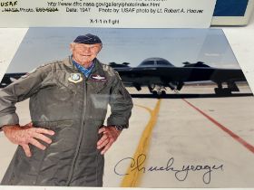 Chuck Yeager autographed photo of himself standing in front of the SR71 Blackbird, together with a