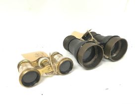A pair of binoculars including a mother of pearl C