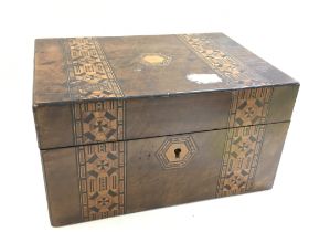 Tombridge type box ( dimensions 18x25x14cm) with a set of pocket knives, a pendulum and key