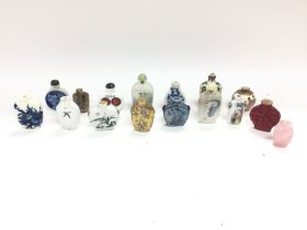 A collection of assorted snuff bottles.