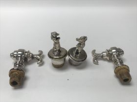 2 novelty silver plated bottle stoppers together w