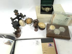 A Collection of items including coins, miniature c