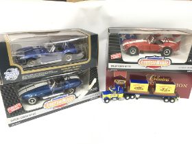 A Collection of boxed model cars including Ertl, M