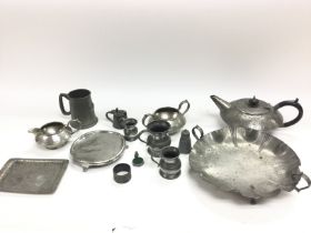 Assorted pewter items including tea pot and trays