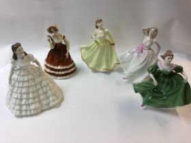 A collection of five Coalport lady figures.