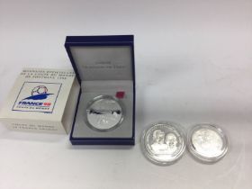 Three coins including a silver France 1998 coin an