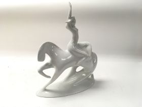 Royal Dux modernist Figurine of a lady and horse.