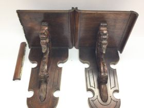A pair of rosewood wall shelve brackets. No reserv