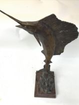 A bronze sailfish sculpture signed LT, approximate