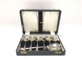 Cased set of silver plated dessert spoons.