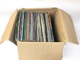 Collection of early house, RnB and hip hop vinyls.