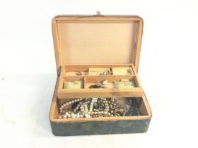 Jewellery box with two layers. Many pieces of asso