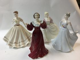 Four Coalport lady figures.