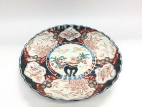 A late 19thC Japanese Imari charger 31cm. NO RESERVE