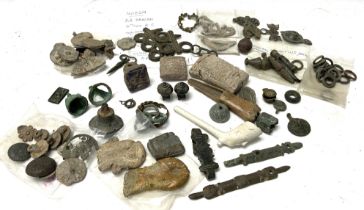 A collection of metal detectorist finds, a small note written inside the cigar box reads all items