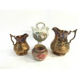 Four vintage ceramic pottery pieces. Including: Tw