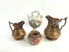 Four vintage ceramic pottery pieces. Including: Tw