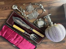 A collection of oddments including a small silver dish, a cased carving set, silver pendant etc.