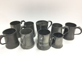 A collection of 19th century and earlier pewter mugs. No reserve