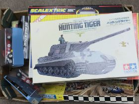 A Collection of various toys including a boxed Tam