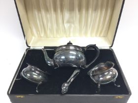 A cased silver plated presentation tea set.