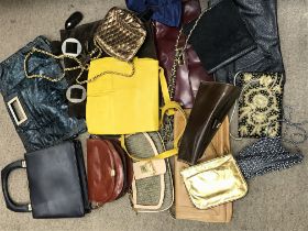 A collection of various vintage ladies handbags