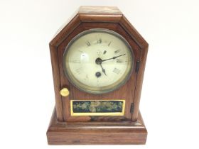 A small mantle clock. No reserve.