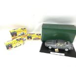 A Collection of boxed model cars including Burago,