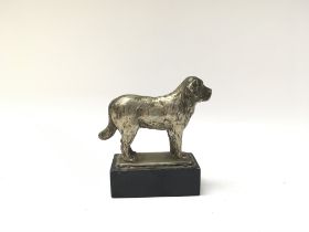 A smal silver plated St Bernard figure mounted on