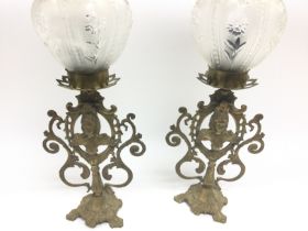 Two Victorian brass and glass lamps one has damage