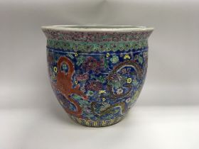 A well decorated 20th century Cantonese jardiniere