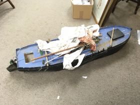 A large model boat, in need of restoration. 115cm