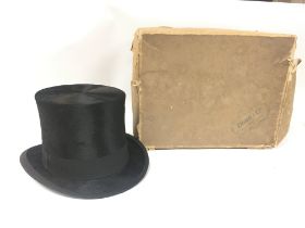 A boxed Dunn & Co all black silk top hat