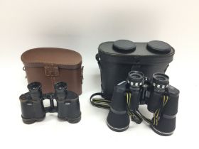 Two cased sets of binoculars. No reserve