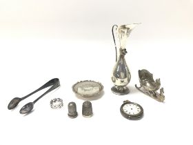 A small Collection of silver objects. (B)