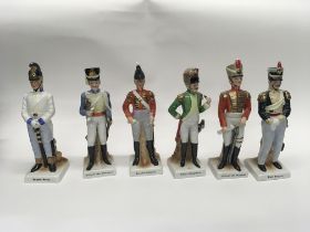 A collection of unmarked ceramic soldiers.