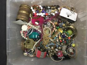 A box of various costume jewellery