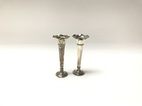 A pair of Sterling silver posy vases. (B)