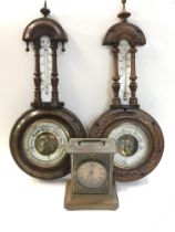 Antique barometers and a metal and enamel mantle clock, dimensions 10x14x15cm