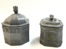 Two 19th century lead tea caddys/ tobacco jars, dimensions 13x10x13cm & 11x8x10cm