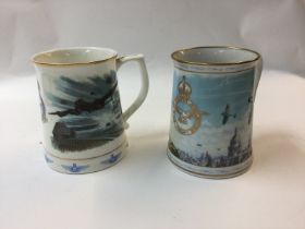 Two commemorative raf mugs.