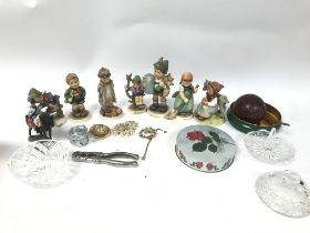 A collection of West German Goebel figures, and ot