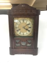 Two clocks including A walnut mantel clock with a