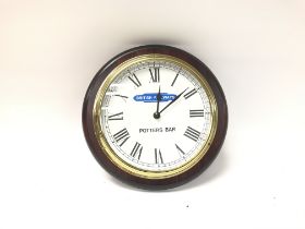 A modern British railways potters bar wall clock.