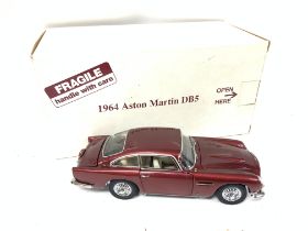 A boxed Danbury Mint 1964 Aston Martin DB5 Coupe r