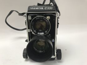 A vinatge Mamiya C220 twin-lens reflex camera, wit