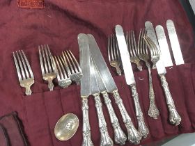 A 16 piece set of Gorham silver knives and forks.