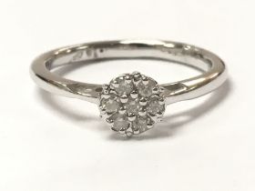 A 9ct white gold diamond cluster ring, 2.2g, ring