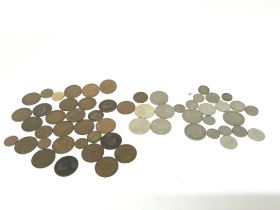 Collection of assorted circulated coinage. Postage