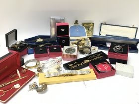 A collection of boxed costume jewellery including